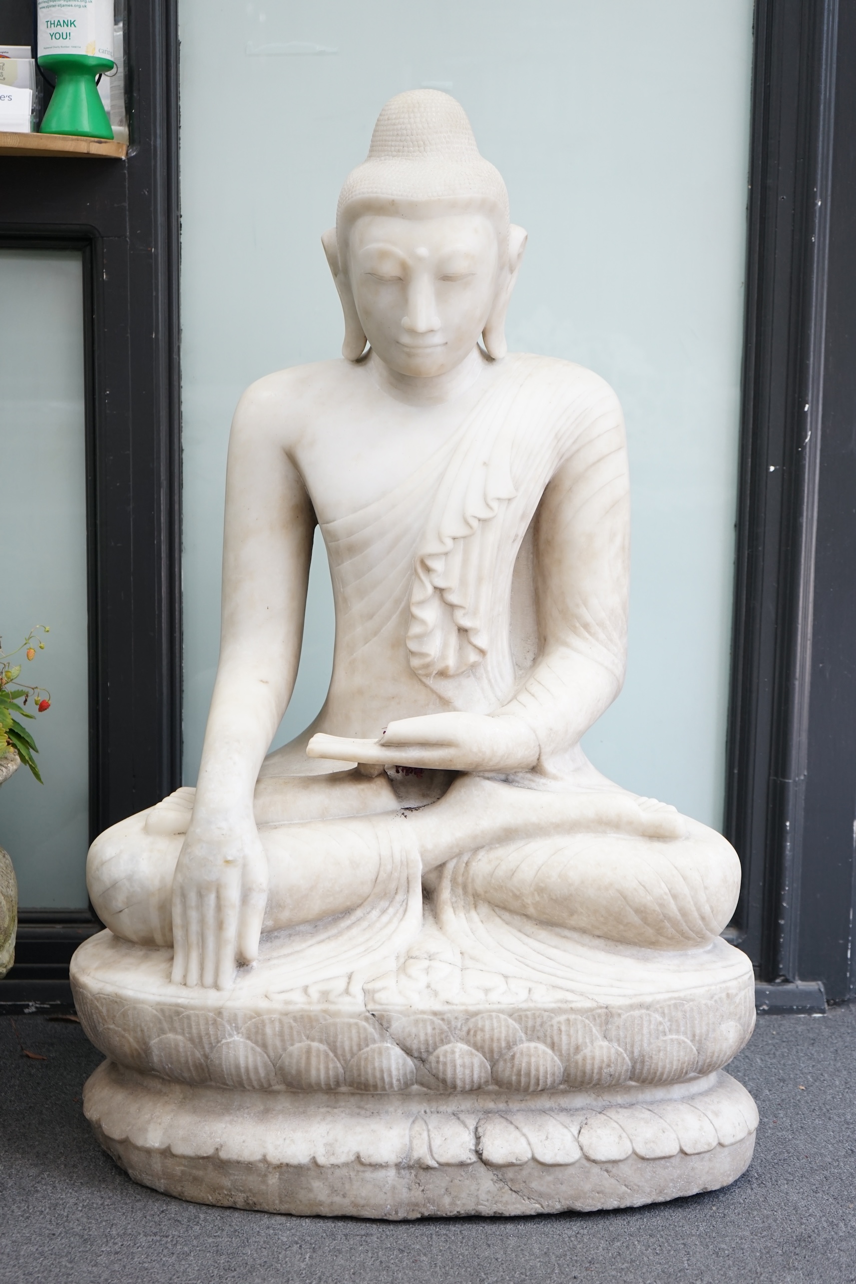 A massive Burmese marble seated figure of Buddha Shakyamuni, 18th/19th century